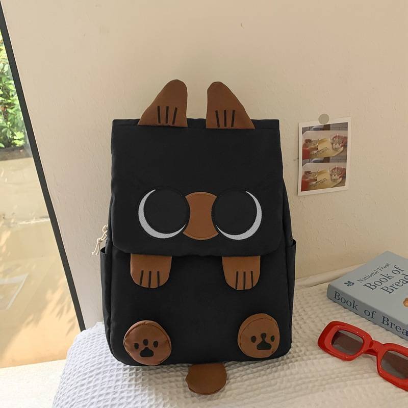 Black Lightweight Nylon Waterproof Schoolbag for Children - Large Capacity Daypack with Ugly-Cute Cat Design