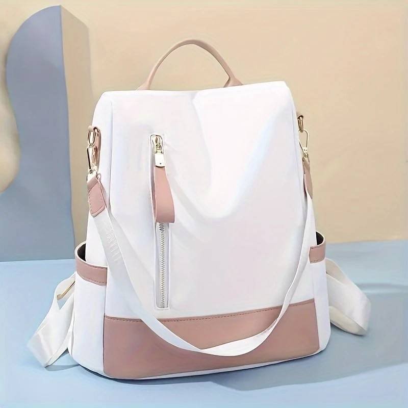 Pink Large-Capacity Travel Backpack & Tote: Lightweight Soft Nylon, Reversible Shoulder Straps, Multiple Pockets, Fits Teens, Students & Commuters.