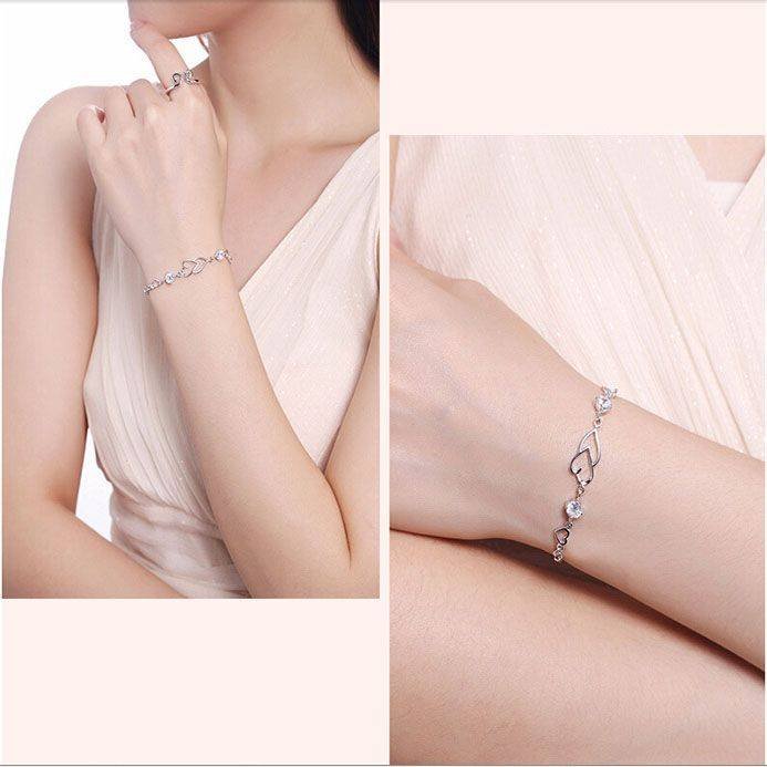 Heart-to-Heart Silver Plated Bracelet with Sparkling Rhinestones Elegant Romantic Jewelry for Women Includes Local Standard Gift Box for Special Occasions(Heart Brand)
